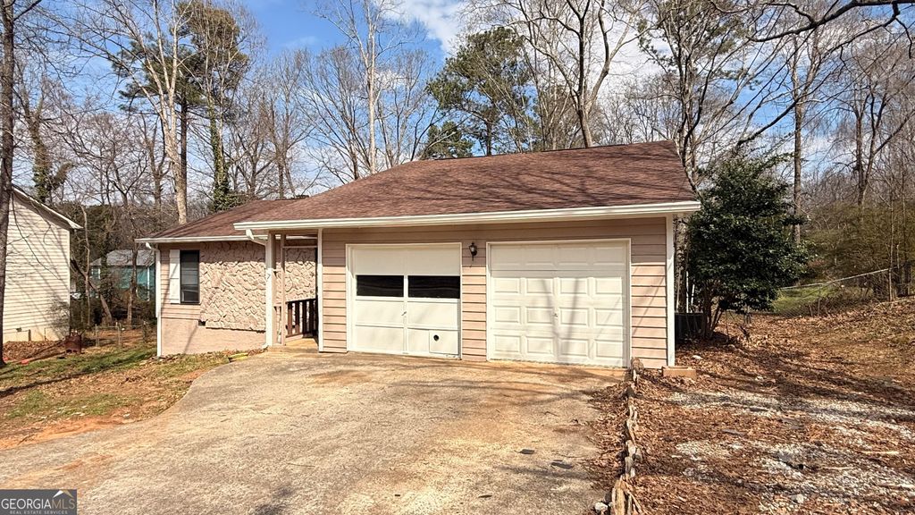 Photo of 6928 Babbling Brook Dr, Rex, GA 30273 (MLS # 10706084)