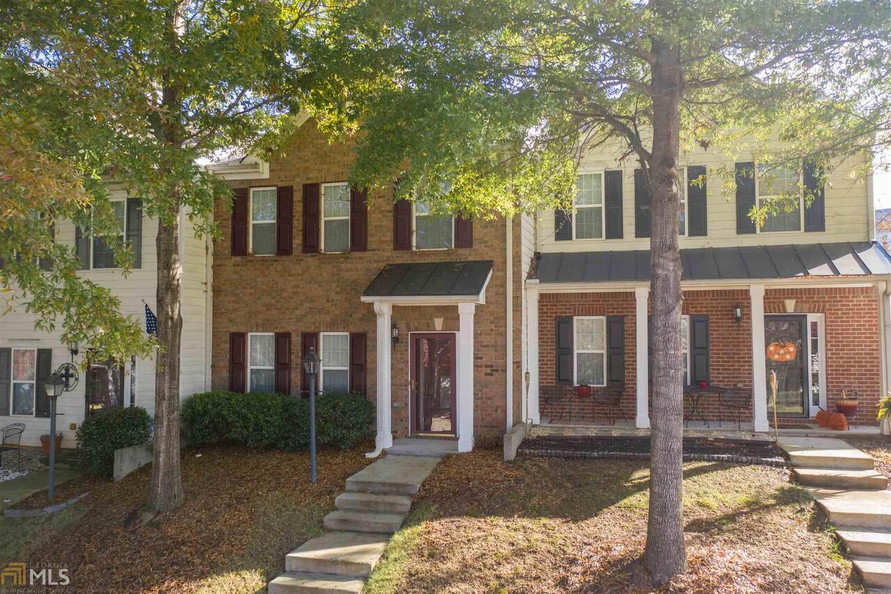 EXTREMELY WELL MAINTAINED condo in sought after SummerGrove in Newnan. On the main floor, this home features a beautiful gourmet kitchen with breakfast bar, pantry, beautiful tile floors and back splash. Very spacious living room with flip switch fireplace with gas logs, dining area, central vacuum hook up and half bathroom. The spacious master retreat and en suite is located on the upper floor. Just off of the master is the laundry room and a guest room with a full private bathroom. There is a double garage with main level kitchen entry. SummerGrove offers many amenities from multiple pools, tennis courts, playgrounds, lake and much much more! This is community living at its finest.