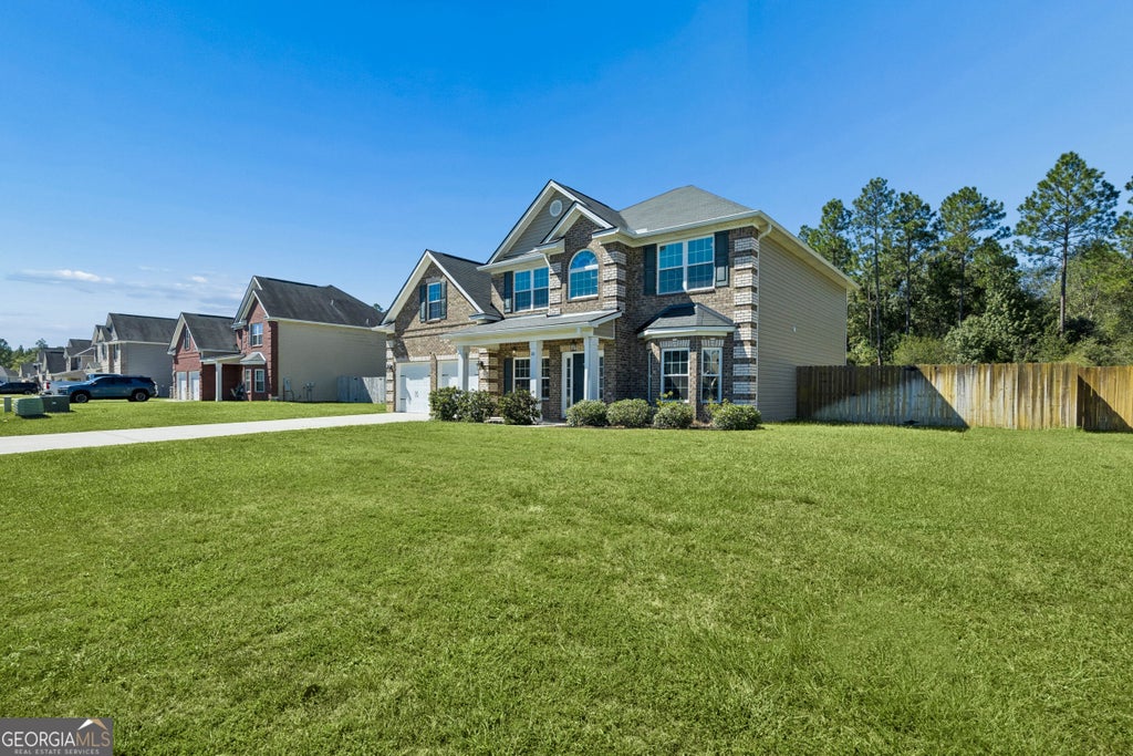 Photo of 118 Fairview Drive NE, Ludowici, GA 31316 (MLS # 10873967)