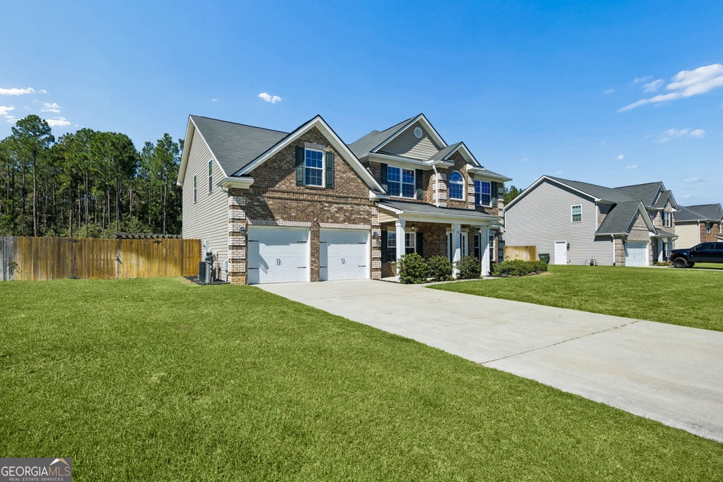 Photo of 118 Fairview Drive NE, Ludowici, GA 31316 (MLS # 10873967)