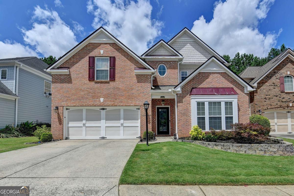 Beautiful home that is minutes to all the shopping and dining in South Forsyth! Close to 400, Lake Lanier and Johns Creek. Fantastic amenities! Top Forsyth schools! Easy care living. Beautiful Home with all Hardwood Fl, Smart thermostats, Ring enabled, EV enabled garage, New dishwasher and Microwave, a private fenced backyard, Newly built porch, Vegetable bed garden etc. Spacious open floor plan with 2 story foyer, formal living and formal dining room, great eat-in kitchen with double oven and a spacious family room with fireplace. Large master with luxurious master bath and walk-in closet and 3 spacious secondary bedrooms and upgraded bathrooms with stand in showers. Freshly painted house, very welcoming and Must see home!
