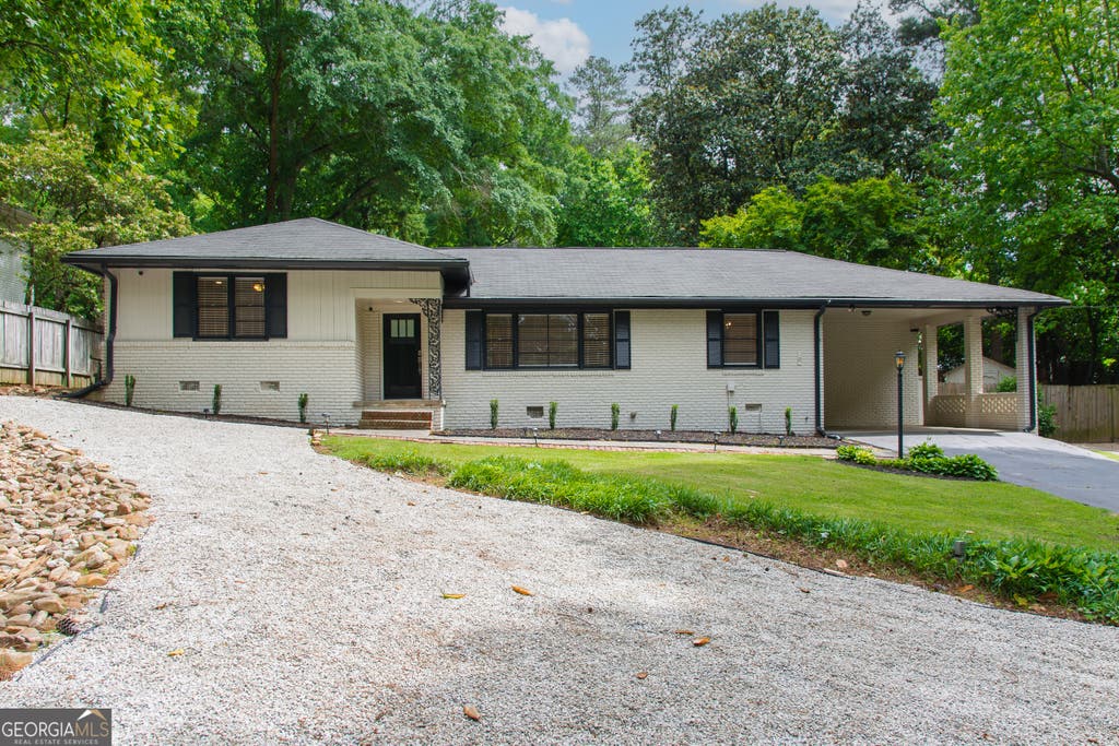 Photo of 4090 Land O Lakes Drive NE, Atlanta, GA 30342 (MLS # 10817503)