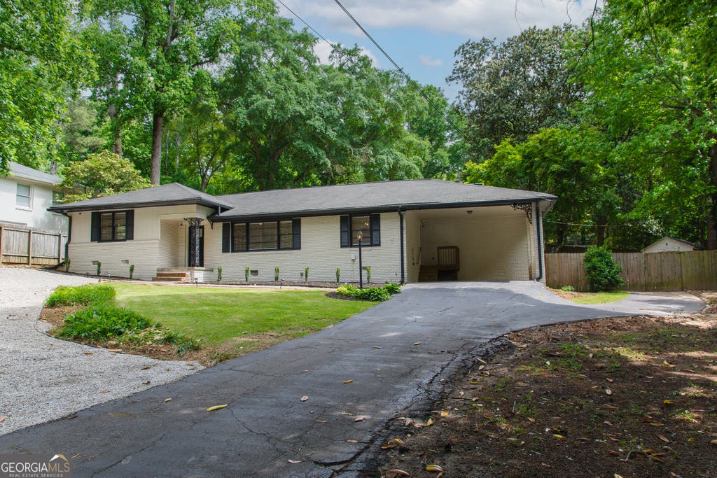 Photo of 4090 Land O Lakes Drive NE, Atlanta, GA 30342 (MLS # 10817503)