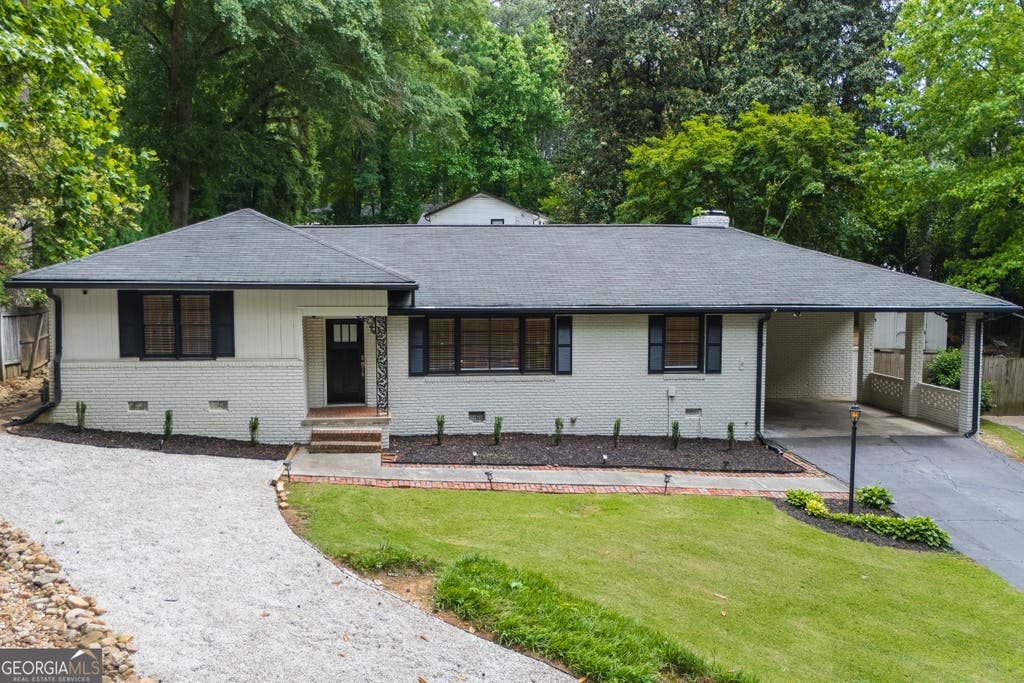 Photo of 4090 Land O Lakes Drive NE, Atlanta, GA 30342 (MLS # 10817503)