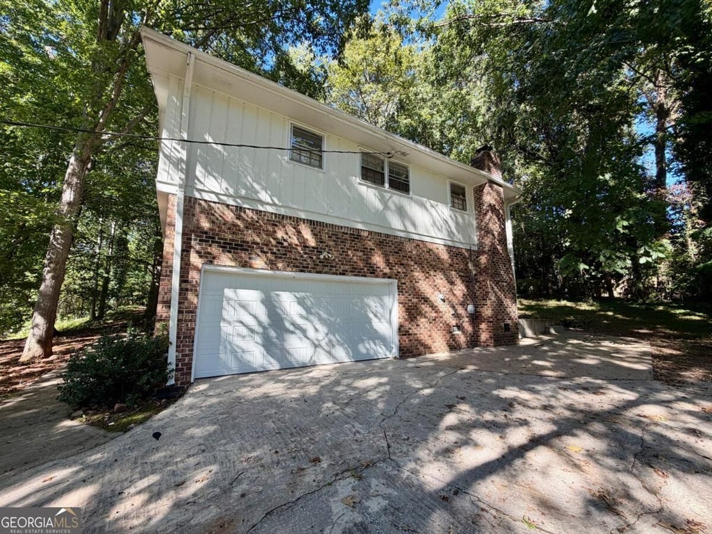 Photo of 380 Shelton Woods Court, Stone Mountain, GA 30088 (MLS # 10854818)
