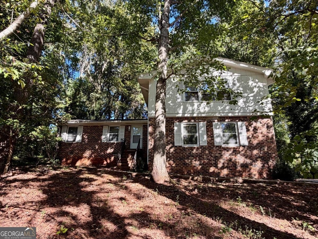 Photo of 380 Shelton Woods Court, Stone Mountain, GA 30088 (MLS # 10854818)