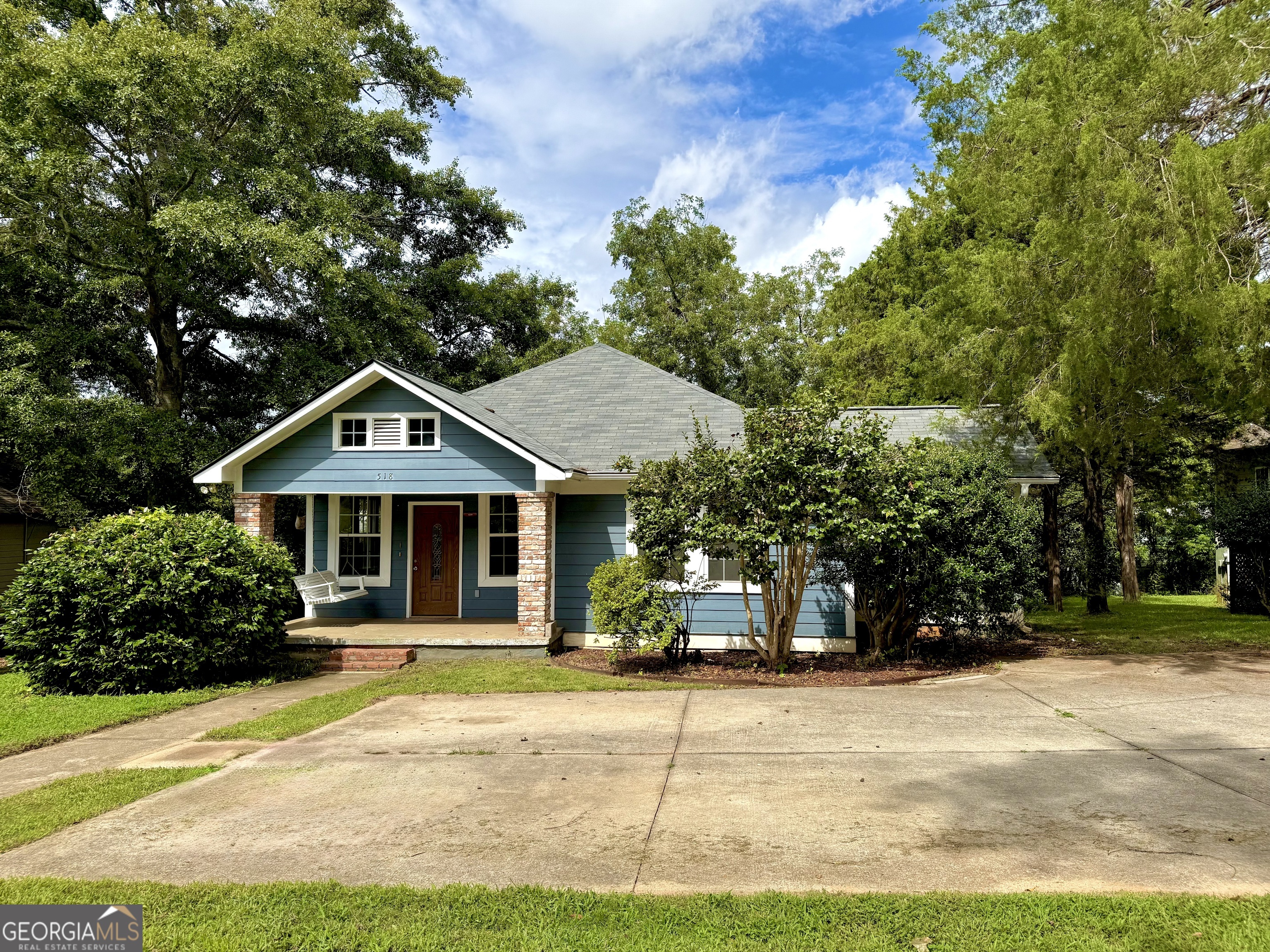 Take advantage of $5,000 in seller-paid concessions to help cover your closing costs or a rate buy-down and step right into your beautifully renovated LaGrange home at 518 S. Lee Street! A beautifully renovated 3-bedroom, 2-bath Hillside home that's ready for you to move in and start living the LaGrange life! From the moment you arrive, the charming front porch with its classic swing invites you to slow down, sip your morning coffee, or enjoy a sunset chat with friends. Inside, tall ceilings and large, light-filled rooms create an airy, welcoming feel, while built-in shelving adds style and function. A cozy gas fireplace in the living room sets the perfect tone for gathering with friends and family, and a decorative fireplace in the second bedroom adds an extra touch of historic charm. The spacious master suite is truly a retreat-featuring its own gas fireplace for cozy evenings, a luxurious en suite bath with a double vanity, and a walk-in closet for plenty of storage. The home also offers a large third bedroom, a conveniently located hallway laundry area, and a second full bath to keep everyone comfortable. The oversized kitchen is a cook's dream, offering an abundance of cabinet space, a pantry for easy organization, and stainless steel appliances ready for your favorite recipes. From the kitchen, step outside to enjoy the freshly built back deck-perfect for grilling, entertaining, or relaxing under the stars. The fully fenced backyard offers space for pets or play and includes a storage shed for all your tools and gear. Off-street parking, large enough for 2 cars, adds everyday convenience. Only 2 miles from vibrant downtown LaGrange, you'll be close to boutique shops, locally-owned restaurants, coffee houses, and lively seasonal events. Highland Marina on West Point Lake is only a 15 minute drive. LaGrange College brings cultural energy to the area, the Sweetland Amphitheatre hosts concerts and community gatherings, and The Thread walking and biking trails connect you to parks and recreation throughout the city. Music lovers will love being within walking distance of Pure Life House of Music, a beloved venue for intimate live performances. Hillside is a historic, welcoming neighborhood where neighbors know each other and life feels relaxed yet connected. Whether you're swinging on the porch, strolling to hear live music, exploring local trails, or enjoying a night downtown, 518 S. Lee Street offers the perfect blend of comfort, charm, and location-you just need to bring your moving truck!