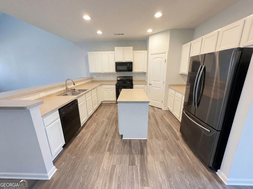 Photo of 943 Liberty Bell Run, Hoschton, GA 30548 (MLS # 10698042)