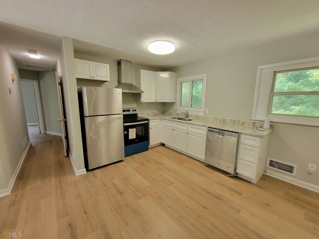 Photo of 6628 Stark Court, Riverdale, GA 30274 (MLS # 10808346)