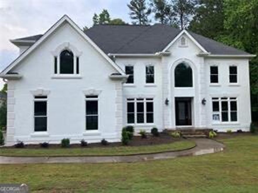 Thornberry is a special community with tennis; pool; gazebo; clubhouse; new playground; sidewalks and streetlights! Many annual events and activities for all interests. Enjoy this wonderful community while also being close to GA 400; Avalon, Downtown Alpharetta; the Greenway; Newtown Park; grocery stores, shops and restaurants! School choices galore with excellent Fulton public, private; charter and magnet school options. The home has an updated gourmet kitchen with Wolf double oven and Wolf cook top plus a 42 inch sub zero refrigerator. New carpet, updated hardwood flooring, new lighting updated bathrooms. Recently painted inside and out. New landscaping including new sod and shrubs. New paint, new lighting, large deck across the entire width at the rear of home and a large under deck area. Both deck and under deck areas are conveniently accessed from each rear room. The main level features a two story foyer, oak hardwood flooring, archways and pillars, a banquet-sized dining room that fits a table for 12, an expansive master suite with built in book shelves, professionally designed closet storage in all closets. The bright basement has incredible storage space offered by the built in cabinets and bookshelves.