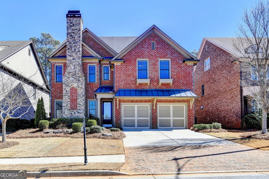 Your dream home awaits!  This home truly has it all.  Be prepared to fall in love with this fabulous four-sided brick beauty with gorgeous stone accents and lovely landscaping.  Fall in love with the beautiful open floorplan inside with hardwood floors throughout main floor.  Two fireplaces to delight you including an unexpected fireplace in the sizeable dining room.  The kitchen features huge granite island, loads of cabinet space, pristine KitchenAid stainless appliances, an extra large walk in pantry and a butler's pantry.  The eat in kitchen is surrounded by windows and leads into the family room.  The kitchen and breakfast area are open to the family room and it's absolutely spectacular.  A bedroom and full bath round out the first floor.  Upstairs enjoy a large primary suite and primary bath with frameless shower, large soaking tub, granite counters and oversized custom closet.  Enjoy three additional bedrooms and two baths upstairs along with a spacious laundry room.  Freshly laid sod makes the yard just scrumptious.  Perfectly located close to the school bus stop.  The neighborhood features a community greenbelt, clubhouse, swimming pool and tennis courts.  Located close to EVERYTHING and newer construction compared to other homes in the area.  Live your best life here!