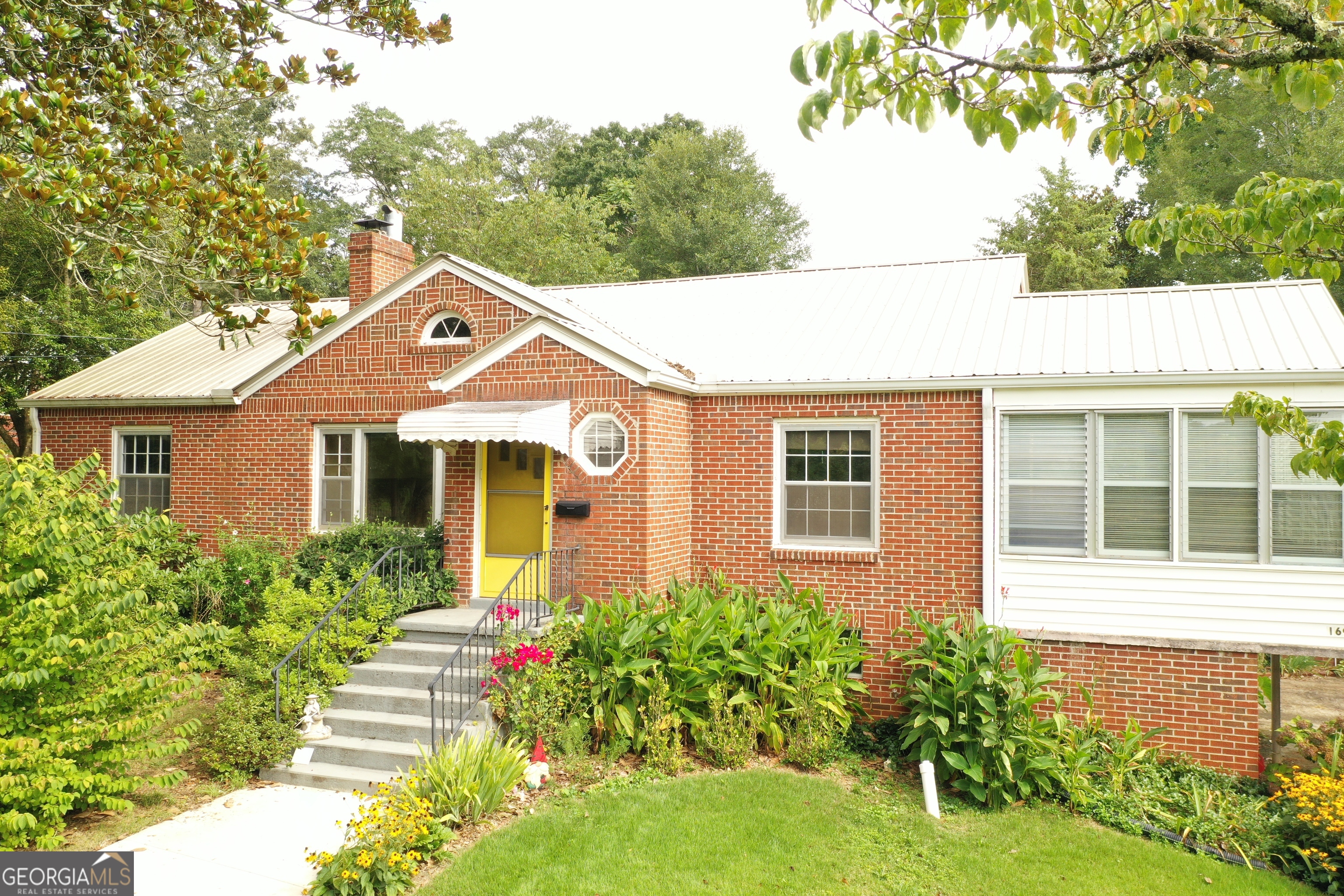 Charming 3BR Brick Home in the Heart of Downtown Clarkesville! Welcome to this well-maintained, brick 3 bedroom, 1 bathroom home just steps from all that downtown Clarkesville has to offer! This classic home is full of character and has been lovingly cared for, with most major items updated in recent years-offering peace of mind and move-in readiness. Enjoy a spacious layout, filled with natural light and timeless charm. The level backyard is ideal for relaxing, gardening, or entertaining, and it's the perfect setup for anyone who wants the convenience of walking to town for shopping, dining, or local events. Additional features include a carport, garage for extra storage or workspace, and a great-sized lot that offers both privacy and convenience. Whether you're looking for your first home, a downsizing opportunity, or an investment in a prime location, this one checks all the boxes. Don't miss your chance to own a solid, stylish home in the heart of Clarkesville!