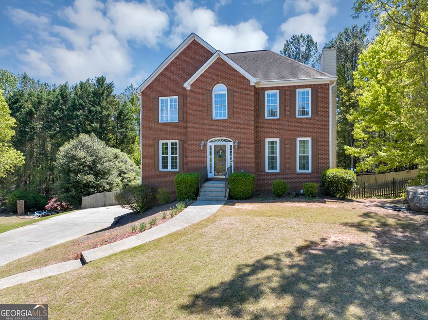 Welcome Home!  Located in the highly desirable Still Elementary and Hillgrove High School district, this beautifully updated 4-bedroom, 2.5-bath smart home offers the perfect blend of comfort, style, and efficiency.    Just minutes from Dallas Highway and the shops and dining at The Avenue West Cobb, this home combines convenience with community living in a prime location.    Inside, you'll find stylish flooring that flows throughout the open main level. The open-concept layout connects the spacious living area to a fully renovated kitchen featuring quartz countertops, modern appliances, and custom touches that make it a true showstopper.    Step outside into the generously sized backyard, ideal for summer nights, weekend barbecues, or simply relaxing under the stars.    Upstairs, the primary suite is a spacious retreat, featuring his-and-hers walk-in closets and a newly updated en-suite bath with double vanities, granite countertops, and a calming atmosphere. Three additional bedrooms and another updated bathroom offer plenty of space for family, guests, or a home office.    This home is part of a vibrant swim/tennis community, offering a resort-like lifestyle just steps from your front door. With solar panels already installed, you'll enjoy energy efficiency and long-term savings year-round.    Complete with a two-car garage, smart home features, and a welcoming neighborhood vibe, this home is truly a hidden gem-ready for you to make it your own.  The seller is contributing $6,000 toward closing costs-don't miss this incredible opportunity!