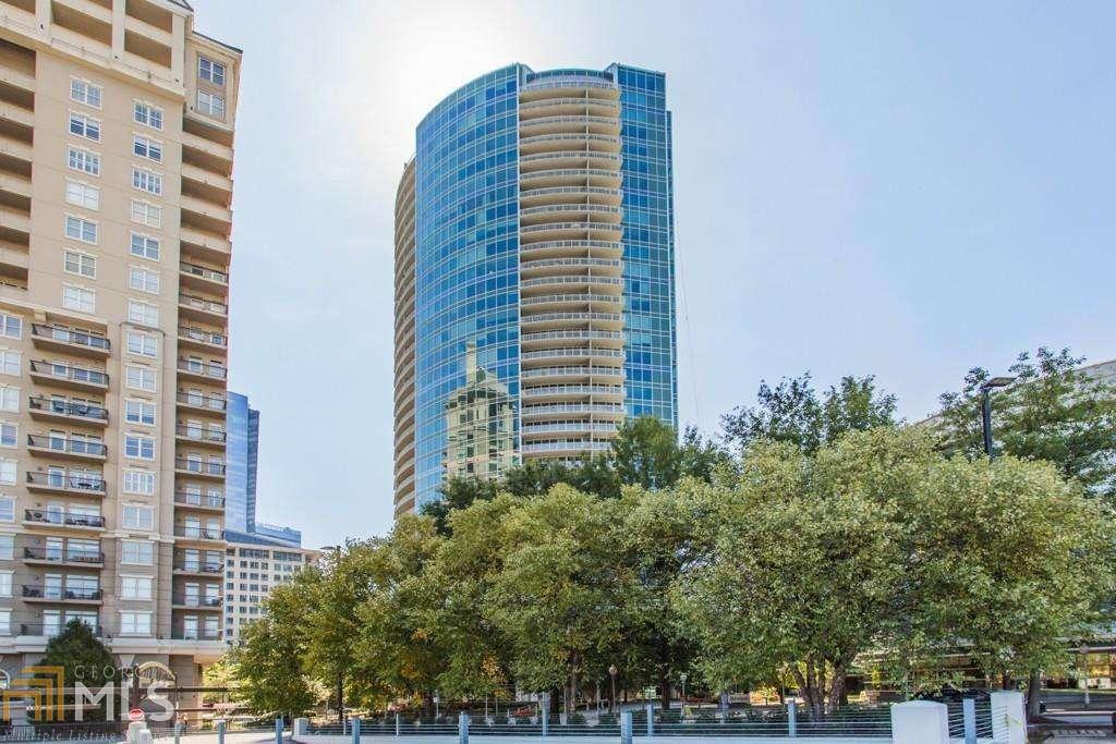 Welcome home to sky high luxury in this very desirable Buckhead building. This home, with the most sought after upper level corner floor plan, has the most incredible unobstructed views north and west, and a great balcony to view them from. High end finishes include granite countertops, stainless appliances, laundry closet in kitchen and gorgeous hardwoods. Brand new water heater. Master suite has a large walk-in closet with custom fittings, and again that view! 2 deeded parking spaces. This is the premiere high rise in Buckhead with so many amenities, including theposh Sky Lounge with breathtaking views of Atlanta, a large fitness center, wine cellar with tasting room, sun deck and bar with grilling area. 24 hour concierge service and minutes to Buckhead's famous shopping and large variety of restaurants.