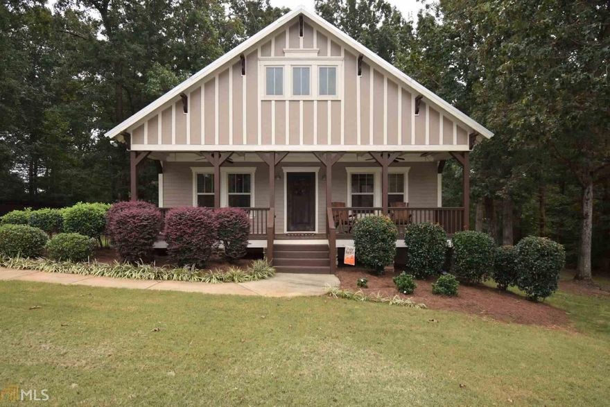 Stunning craftsman style single story home in Colbert, GA! Desirable open floor plan with hardwood and tile flooring throughout the entire home. This home features nine-foot ceilings, granite countertops, custom cabinetry, crown molding and a stacked stone wood burning fireplace. Master suite complete with a large master bath featuring a tile shower with dual shower heads, jacuzzi tub, and a double vanity. Peaceful lot in the Rolling Oaks subdivision. This home has it all! Just 12 miles to downtown Athens and the University of Georgia.