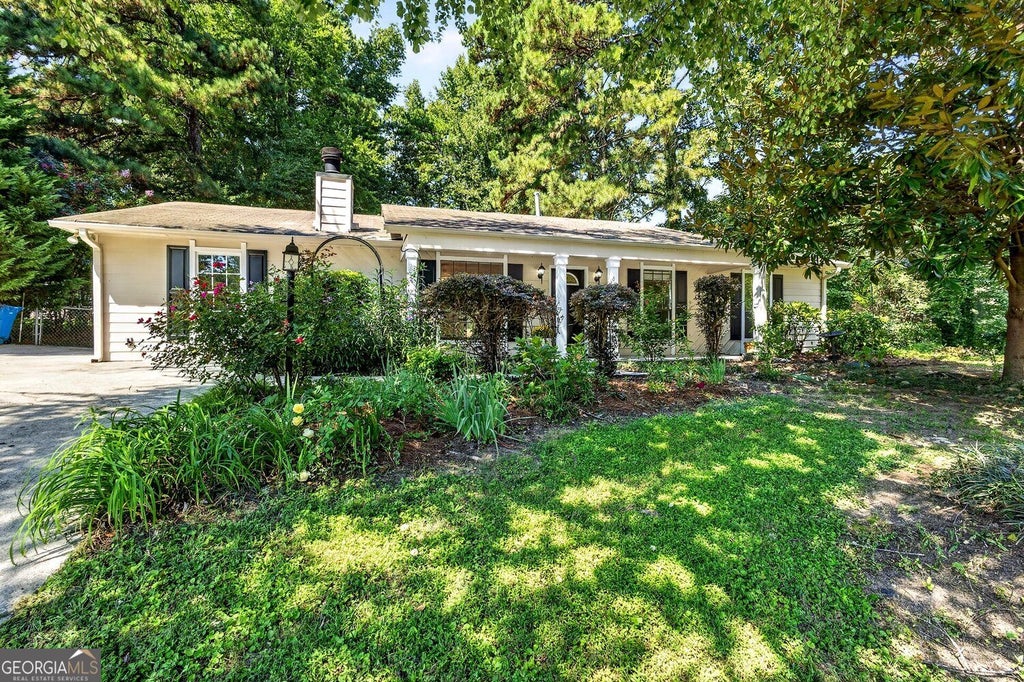 Photo of 850 The Cir, Lawrenceville, GA 30043 (MLS # 10849391)
