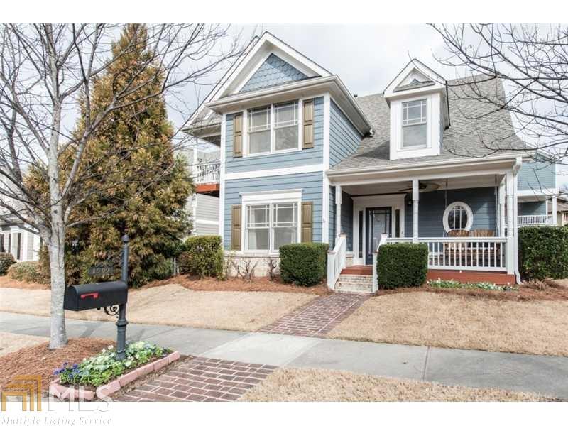 Three bedroom home in sought after Dupont Commons. Hardwood floors upstairs and down. Renovated Owner's suite with oversized bedroom and office space. 3 covered porches. Fenced backyard. Updated white kitchen. Spacious living space.