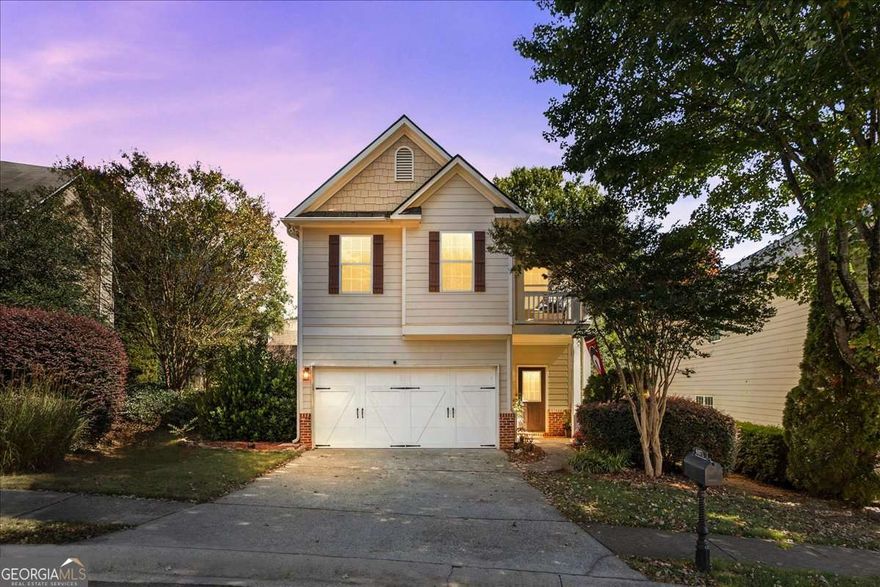 Freshly updated and move-in ready, this stunning 3-bedroom, 2.5-bath home in the heart of Buford combines modern style, comfort, and convenience. Located in a desirable swim and playground community just minutes from the Mall of Georgia and I-85, it features fresh interior paint, new carpet upstairs, and updated lighting throughout. The bright living room offers triple windows and a cozy fireplace, while the renovated kitchen boasts granite countertops, stainless steel appliances, a tile backsplash, and a large center island. A separate dining room adds charm for gatherings. Upstairs, the oversized primary suite includes vaulted ceilings, a walk-in closet, and a spa-inspired bathroom with a soaking tub and updated tile shower. The secondary bedrooms are spacious with ample closet space, complemented by a main-level laundry room and a two-car garage. Enjoy the private, fenced backyard with new landscaping and a patio perfect for entertaining or relaxing. Situated in a well-kept community with sidewalks, pool, and playground access, this beautiful Buford home offers style, space, and convenience all in one-schedule your showing today!