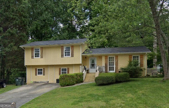 Investor Opportunity or DIY Dream - Spacious Home with Huge Potential This home is ready for your vision and a little (or a lot of) TLC! Featuring an estimated square footage buyer to verify exact size this property offers a flexible layout with updates already in motion. The kitchen renovation has been started: lower cabinets and sink have been removed, while some upper cabinets remain. A refrigerator and oven are in place, and both a new dishwasher and microwave are still in their boxes, ready for installation. The original garage has been converted into two additional bedrooms, providing extra space for guests, hobbies, or a home office. A storage area has been added to the back of the home, and there's also a shed for your outdoor tools and equipment. The backyard is large and fenced, featuring a firepit area that just needs a few bricks to bring it back to life as a cozy gathering space. This property is being sold as-is and offers a great opportunity for investors, flippers, or buyers looking to put in sweat equity. Bring your imagination and make this home your own!