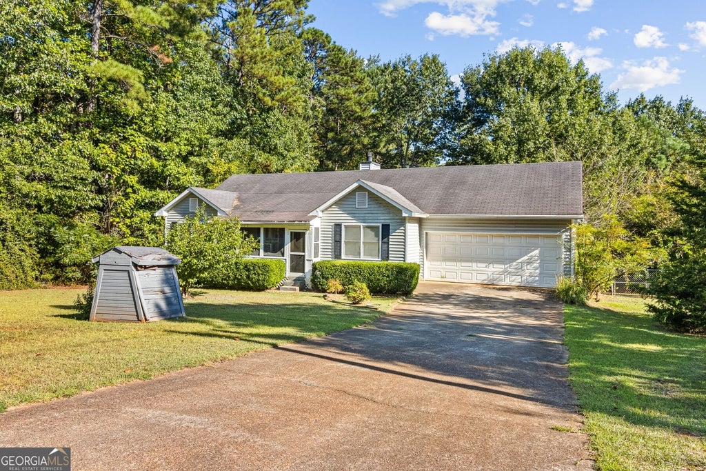 Photo of 211 Island Shoals Road, Covington, GA 30016 (MLS # 10853772)