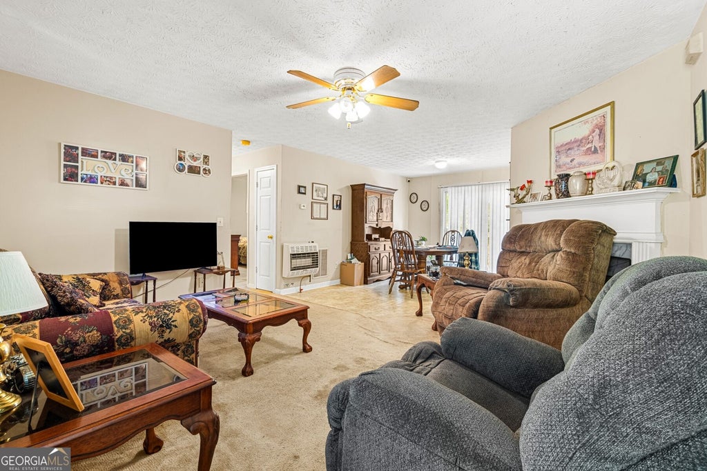 Photo of 211 Island Shoals Road, Covington, GA 30016 (MLS # 10853772)