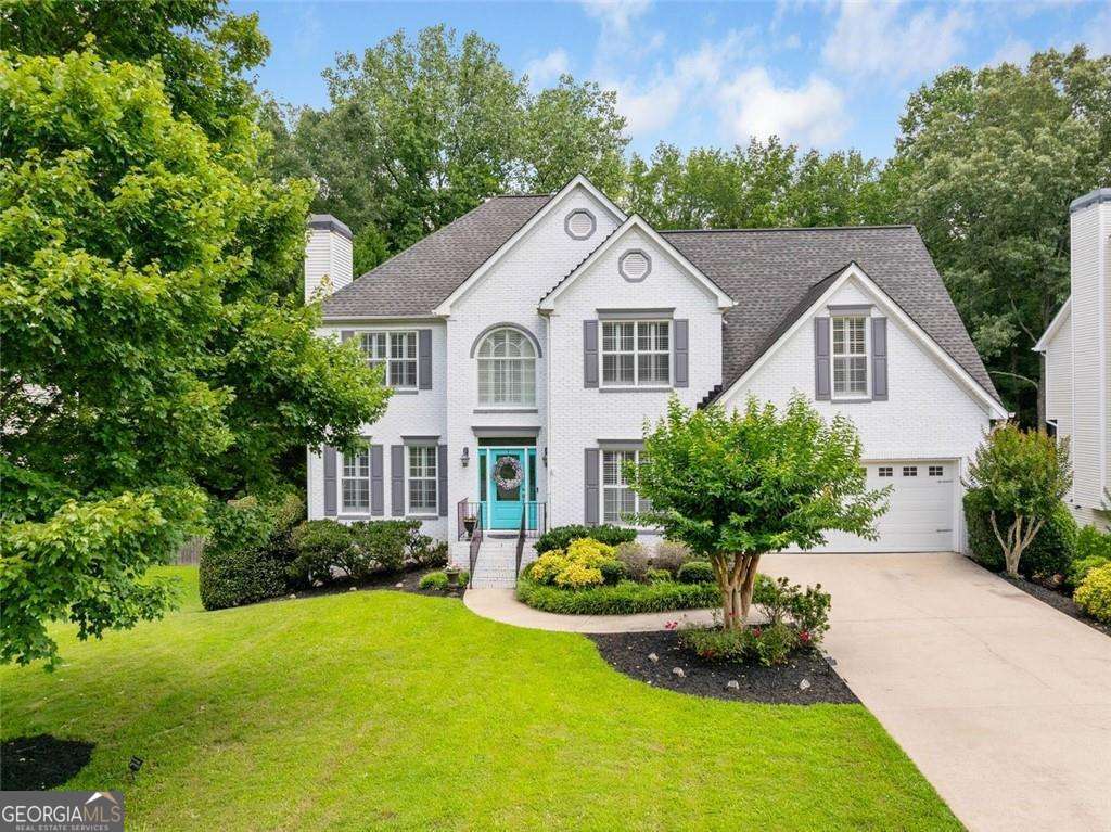 THIS WEST COBB EXECUTIVE HOME IS OFFERED WITH AN ASSUMABLE 2.5% VA HOME LOAN TO QUALIFIED BUYERS* Welcome to 1567 Vine Leaf Drive, an elegant colonial-style residence in West Cobb that beautifully blends timeless design with modern comfort. Situated on a generous 0.36-acre lot, this 5-bedroom, 3.5-bathroom home spans 3,586 square feet of thoughtfully crafted living space, perfect for both lively gatherings and everyday living. As you enter through the stately front door, you are immediately greeted by a soaring two-story grand foyer and sweeping staircase, setting the stage for the home's classic charm. Flanking the foyer, formal and intimate parlor sits to your left with a working fireplace and an elegant formal dining room to your right. Natural light pours through new plate glass windows into the spacious family room, seamlessly connected to an expansive chef's kitchen featuring a central island, abundant cabinetry, and updated appliances. Smart Home features dual Nest thermostats, ADT Security System and smart lighting. A fifth bedroom, currently used as a private office/den, convenient pantry, laundry area, and elegant half bath complete this functional and inviting main level. From the heart of the home, gaze out over your own private backyard oasis. The large Trex deck offers the perfect place for morning coffee or evening grilling, while the sparkling pool, lush landscaping, and custom fire pit create a resort-like atmosphere designed for relaxation and entertainment. In addition, homeowners can benefit from the energy-efficient solar panel display neatly integrated on the roof that provides additional electricity for the home. Upstairs, the luxurious owner's suite provides a true retreat, complete with a spa-inspired ensuite bathroom featuring a jacuzzi tub, a five-head shower with automated temperature and pressure settings, and expansive walk-in custom closets. Three additional bedrooms share a well-appointed bathroom, ensuring comfort for family and guests alike. The fully finished terrace level expands the home's versatility, offering spaces tailored for both fun and relaxation. Discover an open game and playroom, cozy reading nooks, and a private home gym. For the hobbyist or craftsman, a rustic workbench area provides the ideal spot for carpentry or creative projects. Every detail of this home is designed for comfort, elegance, and enjoyment-indoors and out. Located in the desirable Powder Springs neighborhood, this property offers the best of suburban living with easy access to schools, shopping, and dining. (*VA Home Loan assumption does not require military service applicants; inquire with Neil Hediger for details - 678-642-9037).