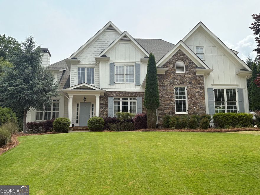 Rare Opportunity in Wild Timber - North Gwinnett Schools | 4BR/3BA | Cul-de-Sac Lot with Private Pool! Welcome to this beautifully updated 4-bedroom, 3-bathroom home on one of the most desirable cul-de-sac lots in Wild Timber, just steps from the Chattahoochee River walking trails. This custom home features an updated white kitchen with quartz countertops, stainless steel appliances, and a stylish backsplash-open to a fireside family room perfect for entertaining.  The main level offers a guest bedroom and renovated full bath, along with formal living and dining rooms, a cozy breakfast nook and a family room steps away from a gorgeous pool. Upstairs, find four spacious bedrooms and two fully renovated bathrooms, including a luxurious spa-like owner's suite and a stunning Jack-and-Jill bath. Enjoy summers in your custom built heated saltwater pool with spa, tanning ledge and endless water features, or sit on your covered pool side porch and enjoy the view.  The large flat backyard offers infinite opportunities for outdoor entertainment.  Expand into the full unfinished basement for endless possibilities. The 3-car garage and extended parking pad provide ample space for guests.  Live in a community that offers a swim team, tennis leagues, stocked fishing lake, a cabin-style clubhouse, playground, and scenic trails-all within walking distance. Located along the banks of the Chattahoochee River in the top-rated North Gwinnett school district, this home blends lifestyle, luxury, and location.