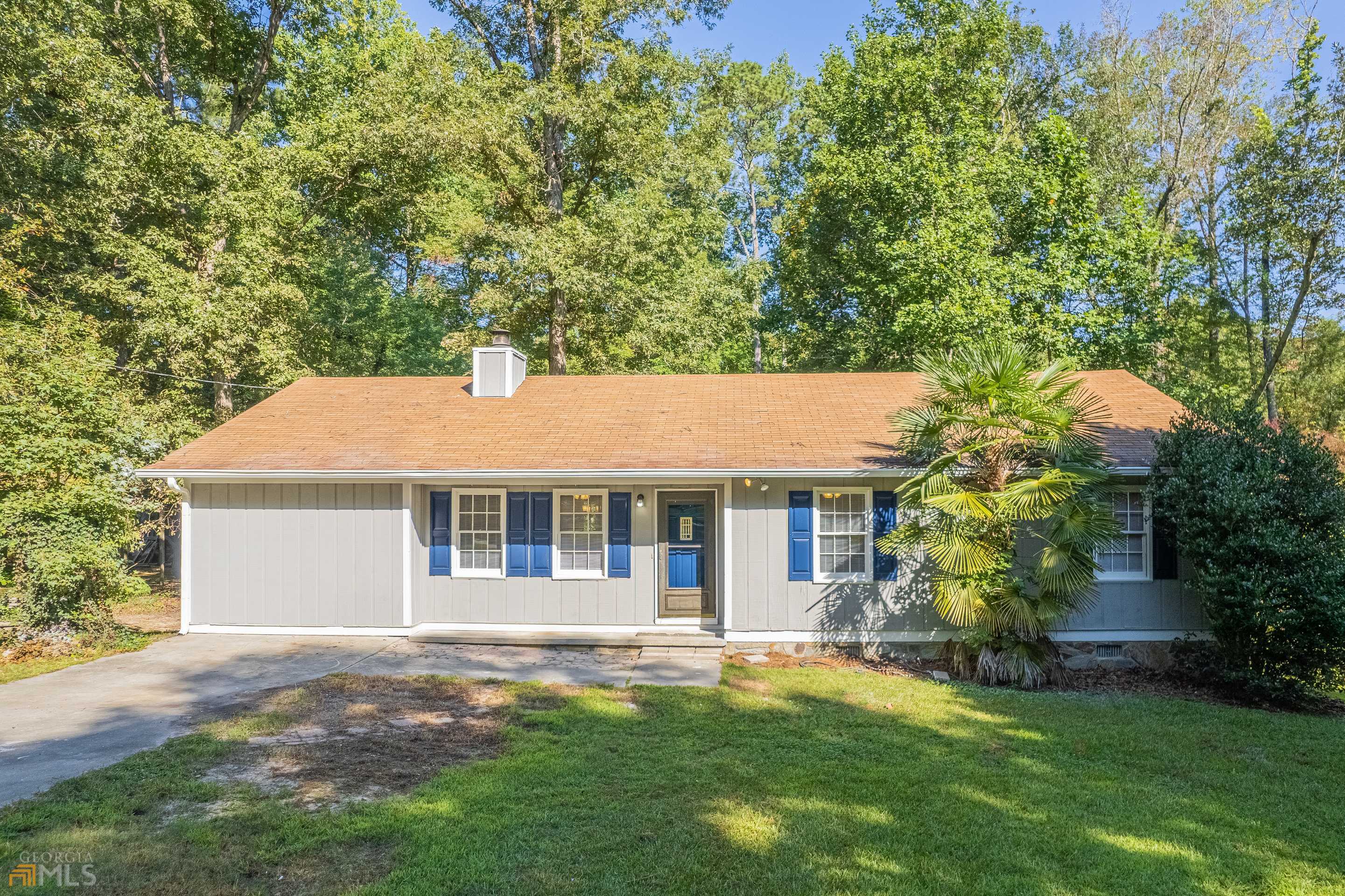 Recently renovated home in heart of Loganville! Nestled on a just under half acre lot, this home is zoned for Bay Creek Elementary and Loganville Middle & High. You will find new carpet and vinyl plank flooring throughout. The living room features a cozy fireplace and built-in shelves. The open kitchen has tons of natural lighting and offers tons of cabinet and counter space. Large utility space and extra living space.