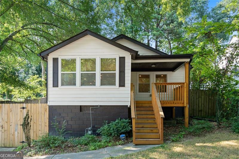 Fully updated in 2023, this 3-bedroom, 2-bathroom home in Grove Park offers modern finishes and a functional layout in a convenient location just minutes from Downtown Atlanta. The spacious kitchen opens to the living room, which is well-suited for entertaining, with plenty of room to cook, gather, and connect. Out back, you'll find a porch with a large fenced-in yard - great for pets, gardening, or outdoor get-togethers. Located less than 10 minutes from Mercedes-Benz Stadium, Centennial Olympic Park, and the Westside BeltLine, this home sits close to some of Atlanta's most exciting development zones. A solid option for buyers looking to build equity in an area that continues to grow!