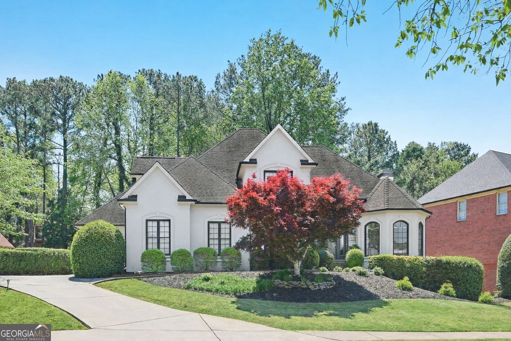 Photo of 9170 Nesbit Lakes Drive, Alpharetta, GA 30022 (MLS # 10730132)