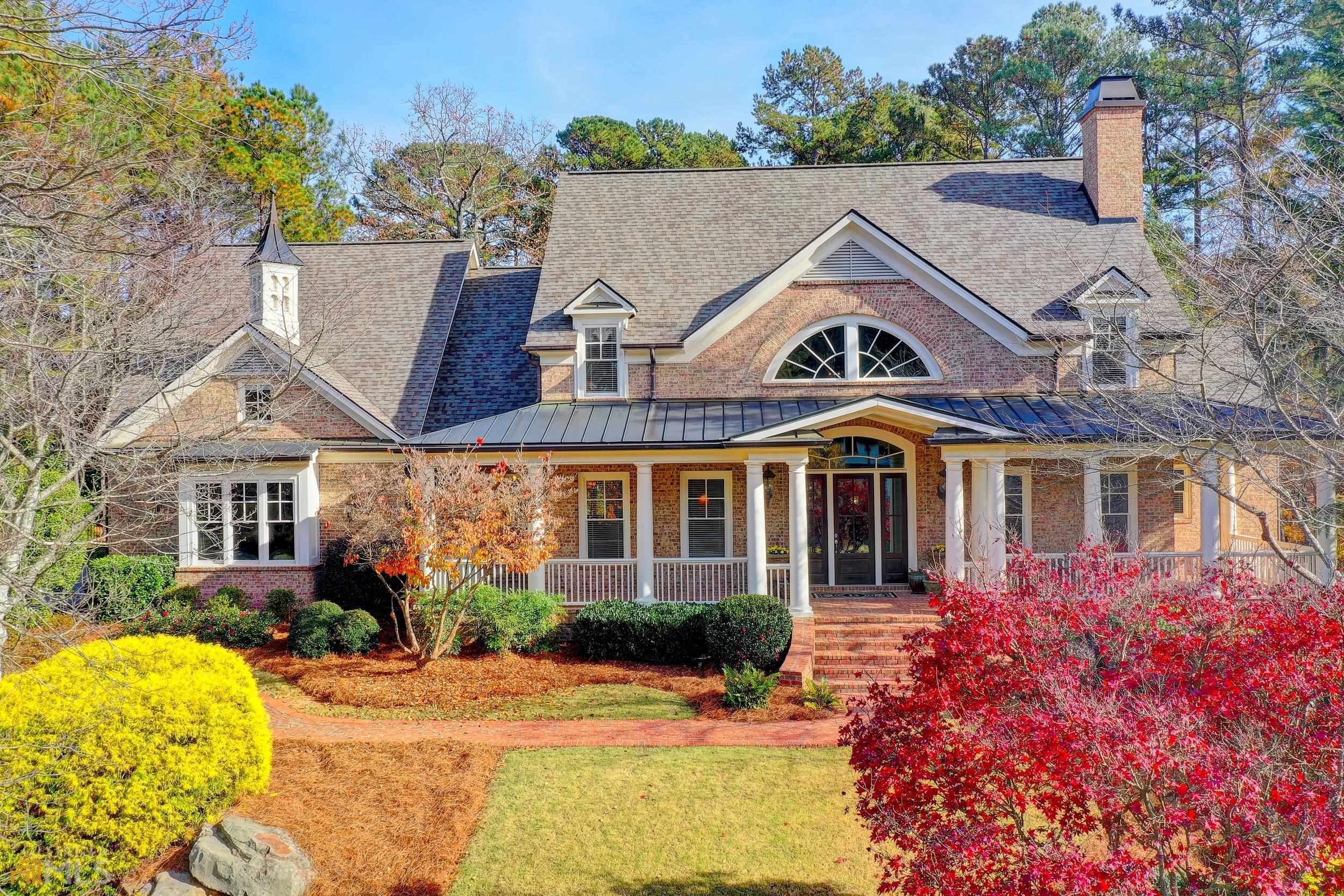 Truly spectacular 5 bed/5 bath/2 half-bath Custom-built MASTER-ON-MAIN, 4-side brick home on a large, level, pool-ready cul-de-sac lot! Beautiful brick wrap-around front porch & custom double front doors lead into the grand 2-story hardwood foyer. Elegant office with picture frame molding, coffered ceiling, marble fireplace & custom built-ins. Family size dining room with crown & picture frame molding, detailed ceiling & hardwood floor. Exquisite 2-story family room with marble fireplace, custom built-ins, upgraded molding & hardwood floor. The gourmet kitchen  features stain-grade cabinetry, a large island, tumbled marble backsplash, gas cooktop, granite countertops, stainless steel appliances, a beautiful wood-paneled ceiling & hardwood floor. Light, bright breakfast room with bayed window & door to the expansive new tiled deck & views of the private backyard. Warm & inviting keeping room with brick fireplace, custom cabinetry, vaulted ceiling & hardwood floor. The romantic main floor master suite features a trey ceiling, sitting area, door to the deck & an opulent spa bath with tile floor & shower, double vanity, whirlpool tub & large walk-in closet. A convenient laundry room & pretty powder room complete the main floor. Upstairs are 4 large secondary bedrooms, one with a sitting room, & 3 full, tiled bathrooms. The expansive, full daylight terrace level has an incredible layout & is just waiting to be finished to your custom specifications and features double doors opening to the large, beautifully landscaped, pool-ready, private backyard! This impeccably maintained home is the ultimate in luxury & is situated in the most sought-after golf/swim/tennis/country club community in Atlanta. Welcome home...