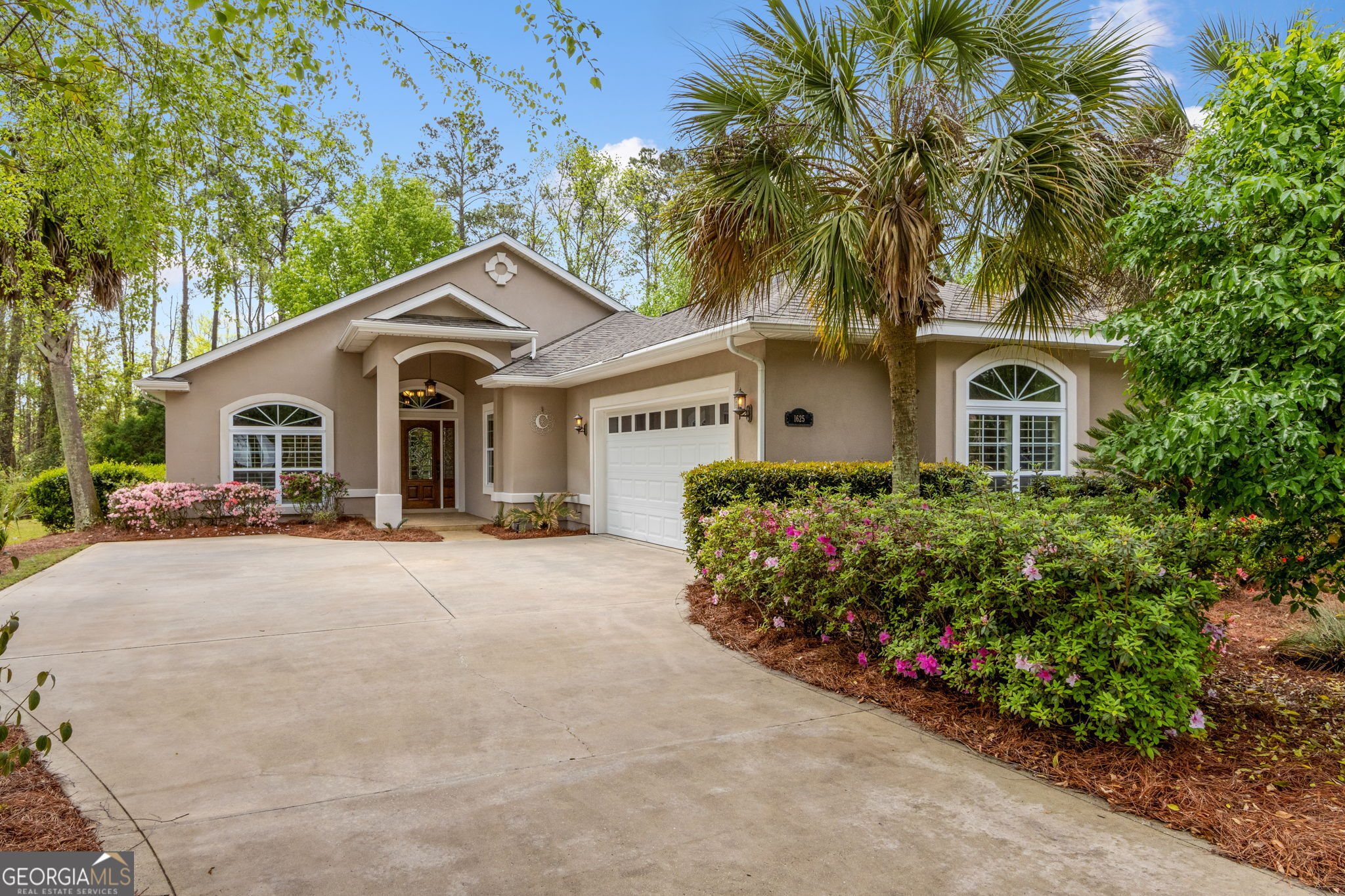Welcome to 1625 Sandpiper within Osprey Cove's Sanctuary enclave! Enjoy everything St. Marys premiere community has to offer: golf, tennis, fishing, boating & swimming. The best part, spend your time on your favorite activities as landscaping is included as part of the HOA fees. This gorgeous and bright 3 bedroom, 2 bath home features a split floorpan, spacious great room and expansive screened in lanai. Large enough for both dining and an additional seating area. Enjoy privacy as the home backs up to a gorgeous green space. Immaculately maintained with a new roof and HVAC system. Sellers are also offering a $2K paint credit at closing to customize the home to your taste. Enjoy evenings dining at the Clubhouse or Tiki Hut by the pool. Easy access to I-95 and the historic St. Marys waterfront district. Private showings available!