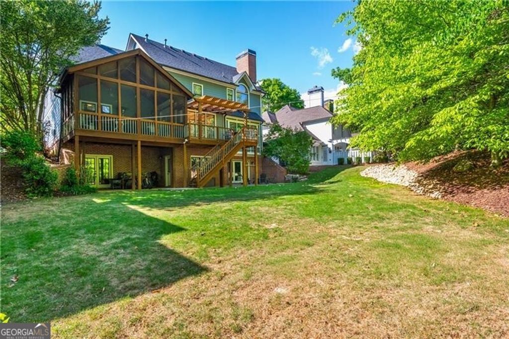 Photo of 7075 Wakehurst Place, Cumming, GA 30040 (MLS # 10753100)