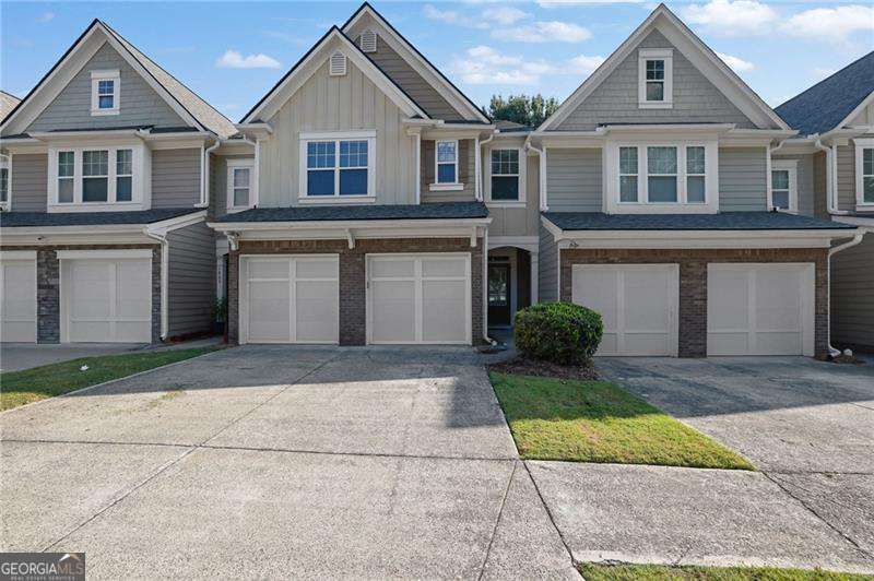 This beautifully updated 3-bed, 2.5-bath townhome sits in the desirable Ellison Lakes Community-just 3 miles from Kennesaw State University, 6-7 miles to Kennesaw Mountain National Park and Smith-Gilbert Gardens, about 5 miles to WellStar Kennestone Hospital, and only 1-1.5 miles to Barrett Parkway's shopping and dining. Commuters will love the quick access to I-75 ( 1.5 miles), I-575 ( 3 miles) and US-41/Cobb Parkway ( 1.5 miles). Inside, you'll find new hardwood floors on the main level, freshly updated kitchen countertops, and a new roof for peace of mind. Upstairs features a spacious loft ideal for a home office, media room, or play space, plus three comfortable bedrooms. Enjoy low-maintenance living with HOA dues that cover the swimming pool, clubhouse, fitness facilities, yard maintenance, water, sewer,termite, and trash service. Sidewalks wind throughout the neighborhood and around the scenic community lake, perfect for a morning stroll.
