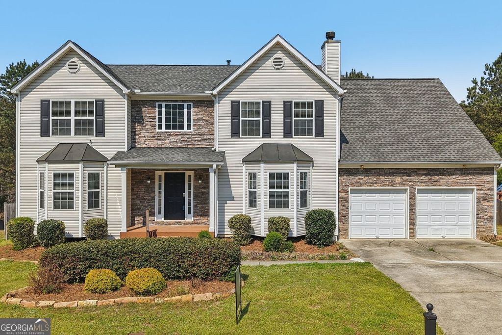 Photo of 5472 Skylar Creek Lane NE, Buford, GA 30518 (MLS # 10721705)