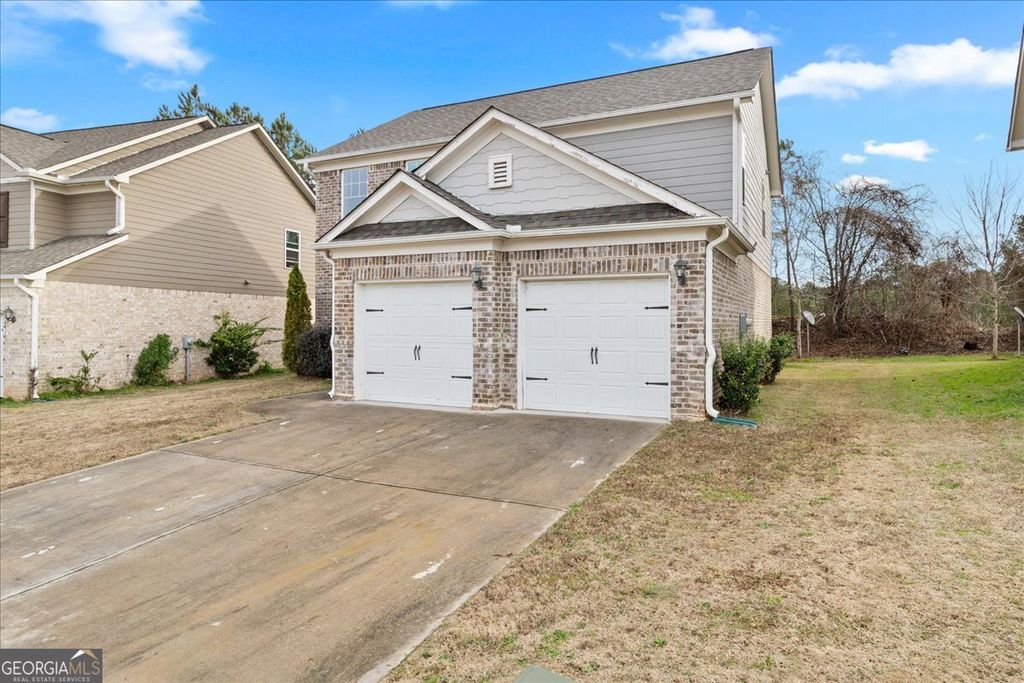 Photo of 116 Al Jennah Boulevard, Locust Grove, GA 30248 (MLS # 10673771)