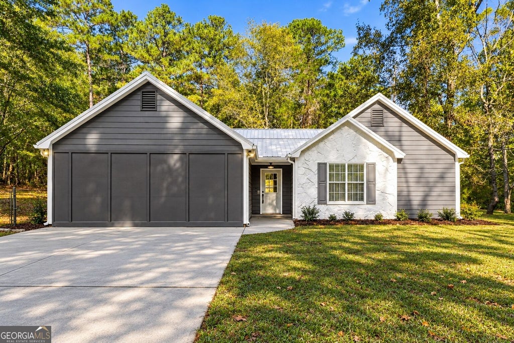 Photo of 1231 Old Jackson Road, Locust Grove, GA 30248 (MLS # 10876178)
