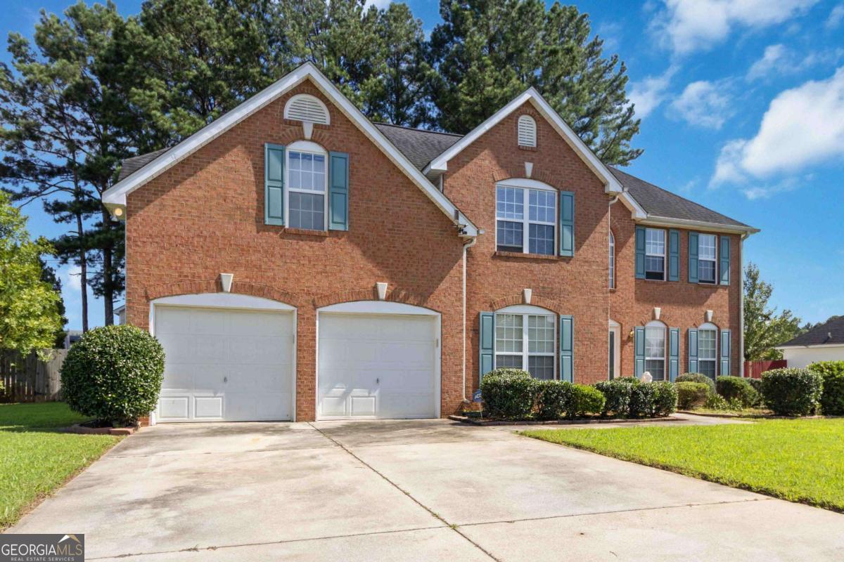 This spacious two-story brick-front home offers endless potential for buyers seeking a property they can truly make their own. Inside, you'll find a thoughtfully designed floor plan featuring a separate living room, dining room, family room, and a bright breakfast area-providing plenty of space for both entertaining and everyday living. A vented sunroom extends the living space and is perfect for relaxing year-round, while a detached large patio creates the ideal setting for outdoor gatherings. The property also includes a convenient storage shed on a slab foundation for additional functionality. The master suite is generously sized and features a comfortable sitting area along with a walk-in closet, making it a private retreat within the home. With a little TLC, this home can be transformed into something truly spectacular. Located in a beautiful neighborhood, this property combines charm, space, and potential all in one.
