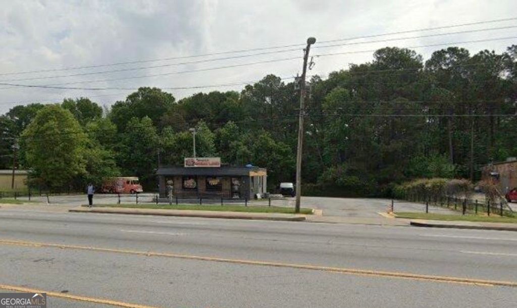 Photo of 6496 Highway 85, Riverdale, GA 30274 (MLS # 10685015)