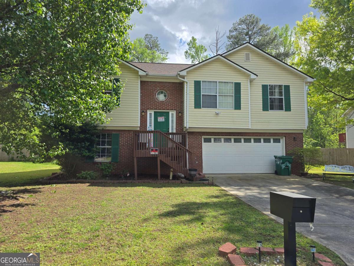 NOW READY TO SHOW! No HOA in well established community. Almost 2000 square feet of Living Space! NEWER installed ROOF, HOT WATER TANK and HVAC as of 2020. Split Level Home Floorplan with 4 BEDROOMS and a 5th BONUS ROOM for ample Living Space. 3 FULL Bathrooms with a few updates. UPDATED KITCHEN with and Flooring. UPDATED light Fixtures and Ceiling Fans Throughout. The Family Room includes a cozy FIREPLACE and SEPARATE DINING ROOM open to the Kitchen. REAR DECK with STAIRCASE. Basement/Lower Level Complete with Walk Out Entrance. 2- CAR GARAGE with garage door opener installed as of 2020. INVESTORS Welcome! Daylight Basement includes a Spacious Bedroom, Bathroom and room that may be used as a Bonus Room or Entertainment Area. Below Market Price. Tenant No Longer Occupied. Being Sold-As-Is with Right of Inspection.