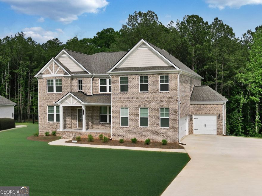 Welcome to Your Dream Home - Grab the model home of Trinity Park on a basement for less!  Like New, Completed January 2025 with the option to Assume as a Veteran at 5.62% located in Trinity Park of McDonough, GA.       Step into modern comfort with this expansive Clarity Plan of over 4000 square feet, 5-bedroom, 4-bathroom home nestled on a private wooded lot. Designed for everyday living and effortless entertaining, the main level offers a full bedroom and bathroom, a formal dining room a cozy living room, and an inviting family room that opens to a gourmet kitchen with direct access to the deck - perfect for morning coffee or weekend barbecues.     Upstairs, enjoy a versatile loft space, a convenient laundry room, two bedrooms with a Jack and Jill bathroom, another bedroom with its own private bath, and an impressive owner's suite featuring a sitting area, huge walk-in closet, his and hers vanities, soaking tub, and a luxurious oversized shower.      Additional highlights include a covered front porch, full unfinished basement with endless potential, and a 3-car garage. With construction completed in January 2025, this like-new home offers modern finishes and thoughtful design throughout.      Don't miss the chance to make this wooded retreat your home! This home is the same plan as the model home on a full unfinished basement.  Some photos are virtually staged