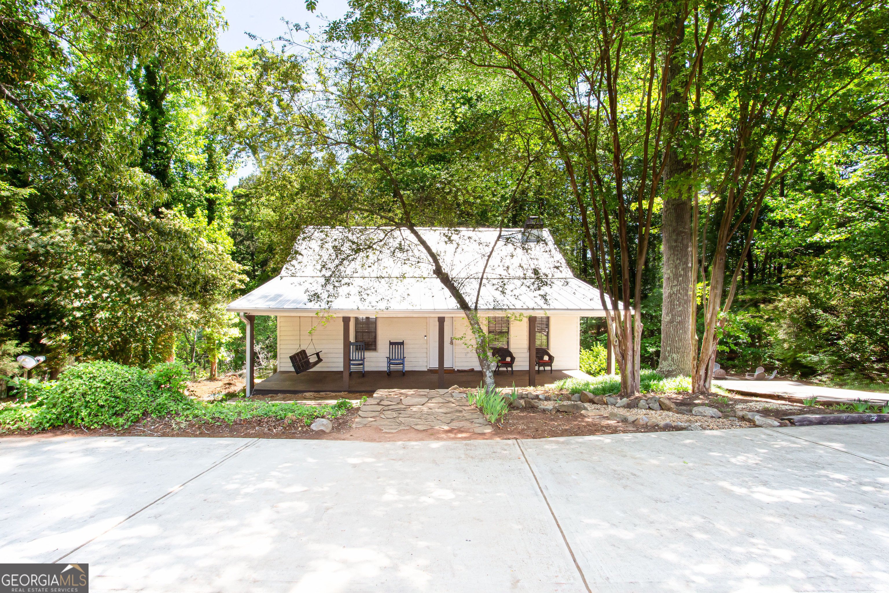 Welcome to this beautifully FULLY FURNISHED. and maintained 4-bedroom, 2-bathroom bungalow style home nestled in a quiet, tree-lined road with a picturesque pond behind it. This two-level move in ready home offers a perfect blend of classic charm and modern updates, featuring hardwood floors, a spacious open-concept living and dining area, and a bright kitchen with all the appliance ammenities. The primary bedroom on main floor includes ample closet space, while the 3 additional bedrooms offer flexibility for a growing family, guests, or a home office. The two full modern bathrooms provide ample space and luxury. Step outside to a private backyard yard with large deck over looking a gorgeous pond that is sufficiently stocked with fish. The deck is spacious and ideal for entertaining or relaxing. With mature landscaping, and close proximity to parks, schools, and shopping, this home is a rare find. Perfect for first-time buyers, downsizers, or anyone seeking comfortable convenient living. Your search stops here. This beautiful home comes fully furnished. Don't miss this amazing opportunity!Welcome home!