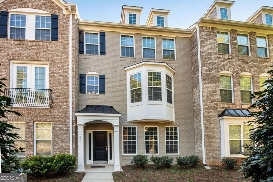 Never have to worry about missing out when you live here! What a great location for Avalon, Alpharetta, The Loop, Big Creek Greenway, Ameris Bank Amphitheater, Shopping, Dining, and easy commutes on GA400. Open and Bright best describe the feel in this home, beautiful hardwood flooring throughout the terrace level and main floor, loads of natural light and open concept living. Entertaining is a breeze with the open feel of the main level, with the breakfast bar for a quick meal or buffets for your guests. Family room, living room and kitchen easily flow for quality family time or room for a crowd, chilling on the deck is convenient just off the kitchen breakfast room. Upstairs offers new carpeting, spacious primary suite, updated primary bath & customized walk-in closet. Two additional bedrooms, for guests or 'work at home' office, and secondary bath with an oversized vanity. All this with award winning schools and neighborhood recreation amenities, Welcome Home!