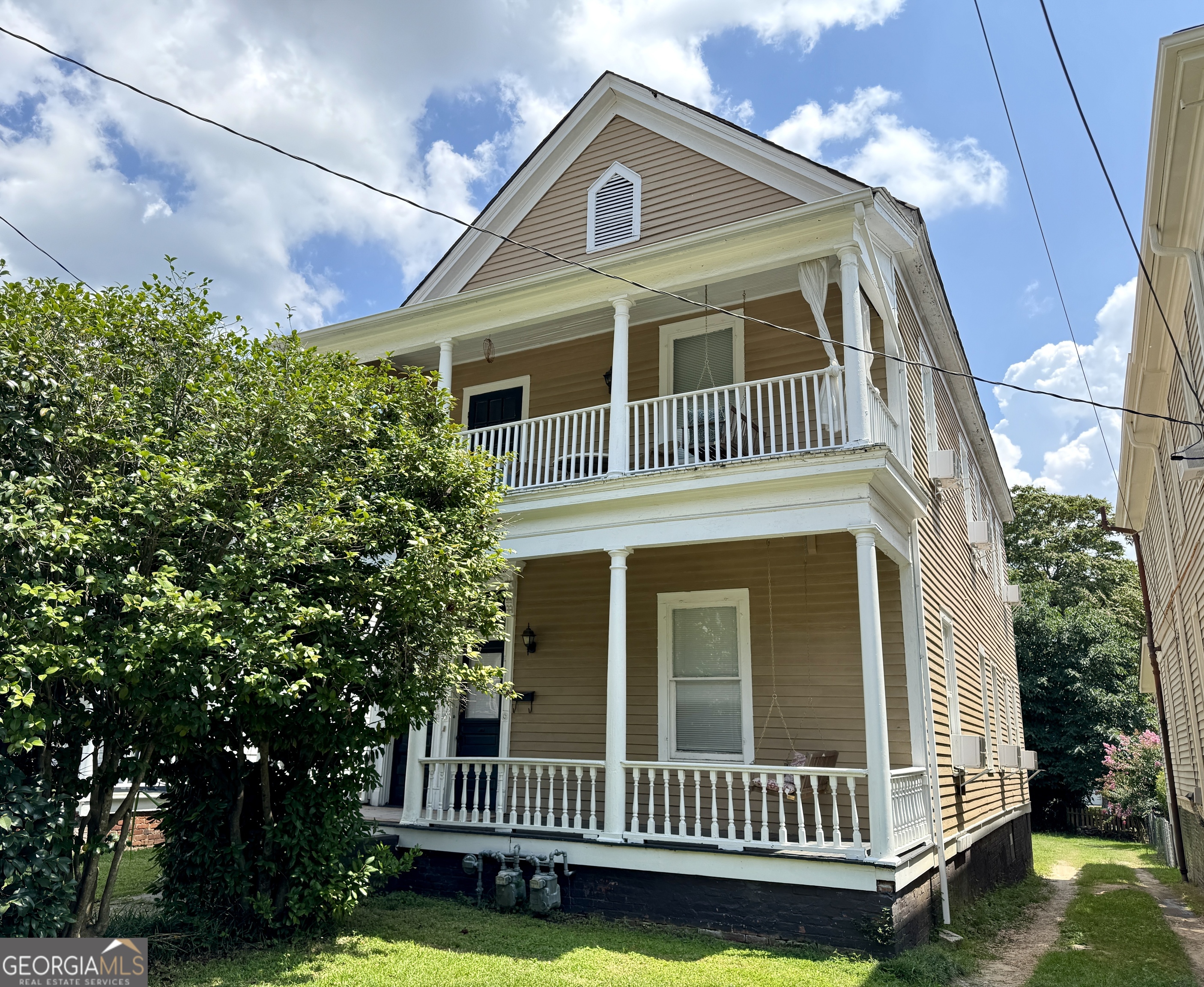 Downtown Macon duplex in a prime location! Next to Atrium Health Hospital, this property is ideal for short term rentals. Each unit has 2BR/1BA, spacious rooms, high ceilings, hardwood floors, private front porches and back decks with off-street parking. Updated electrical, newer water heaters and updated kitchens. All furnishings and appliances will remain. Schedule your appointment today!