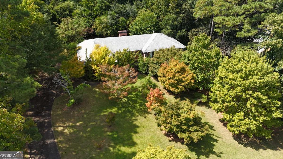 Incredible Opportunity Large Four-Side Brick Ranch Sitting on Golf Course Lot. 5 Bedroom 3 Full Bath, Finished Basement. Fixer Upper Would Create a Beautiful Showplace. Mold and Mildew present. Enter at your own risk.