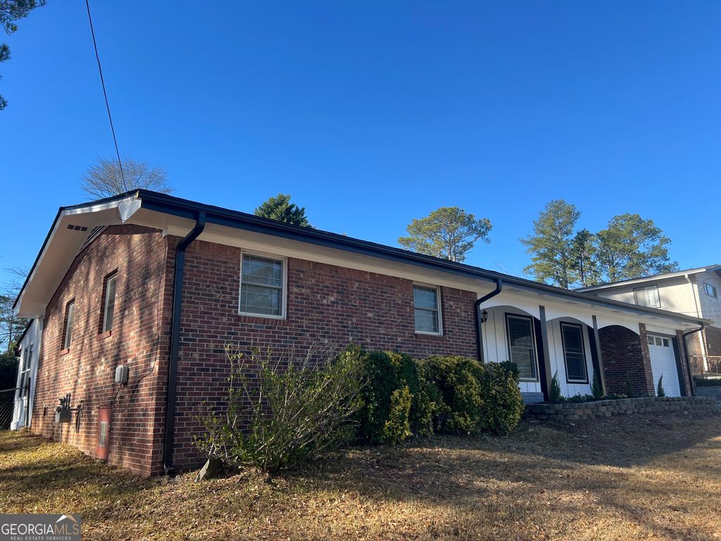 Photo of 6413 Maddox Road, Morrow, GA 30260 (MLS # 10769576)