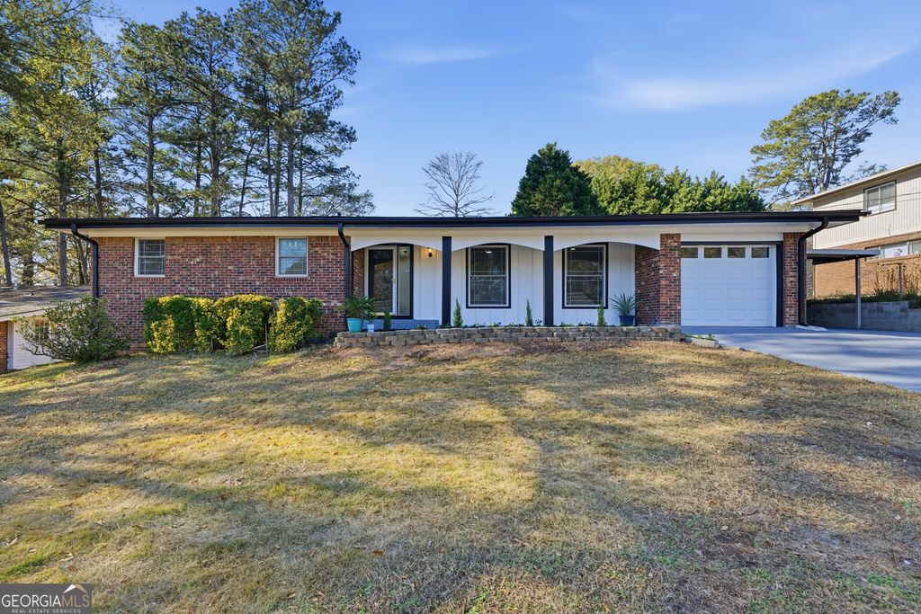 Photo of 6413 Maddox Road, Morrow, GA 30260 (MLS # 10769576)