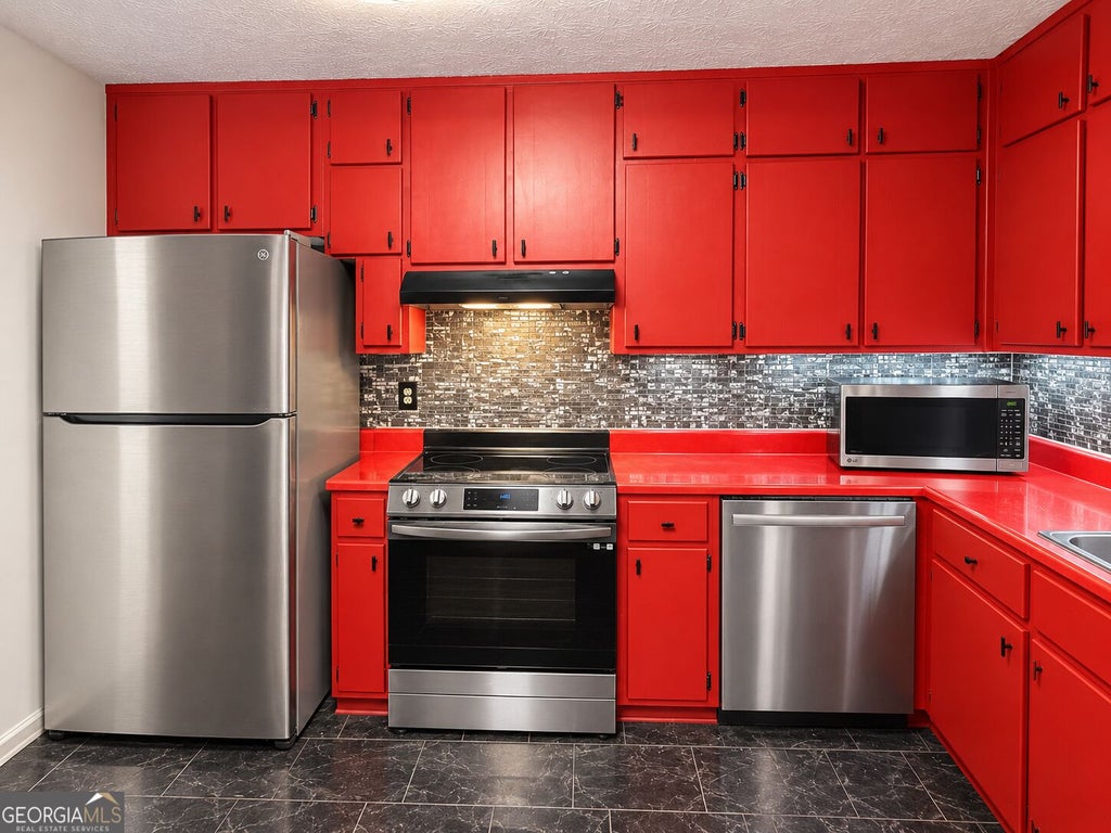 Photo of 1921 Fisher Drive, Stockbridge, GA 30281 (MLS # 10854722)