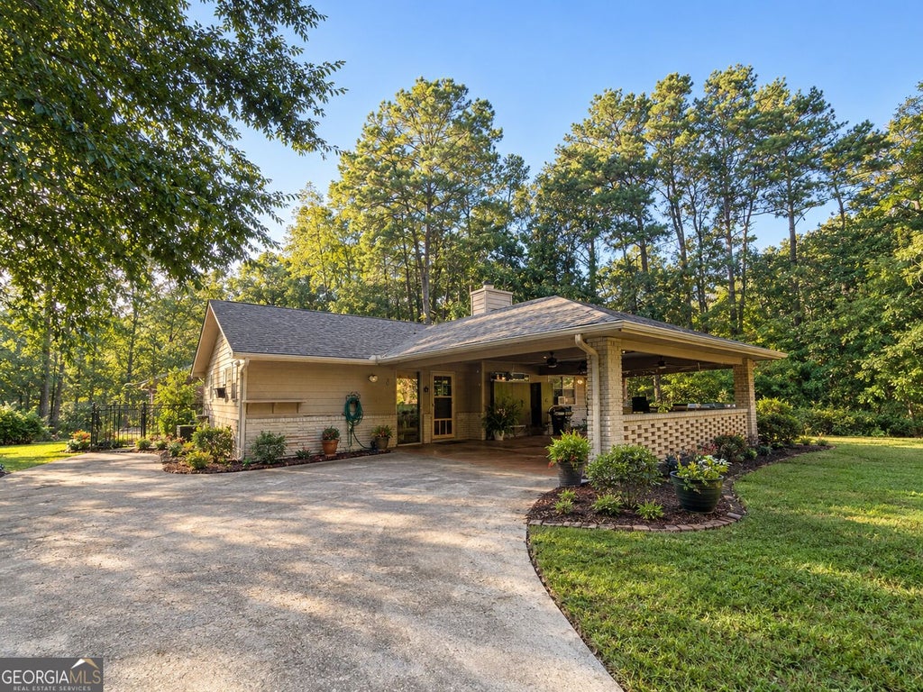 Photo of 1921 Fisher Drive, Stockbridge, GA 30281 (MLS # 10854722)