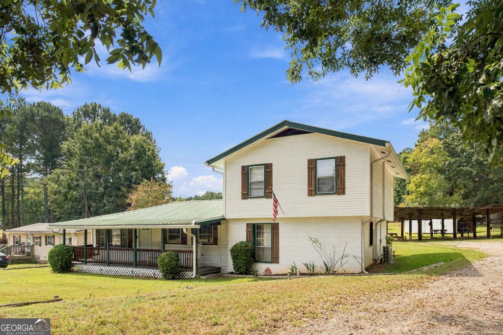 Photo of 3810 Claude Brewer Road, Loganville, GA 30052 (MLS # 10852784)